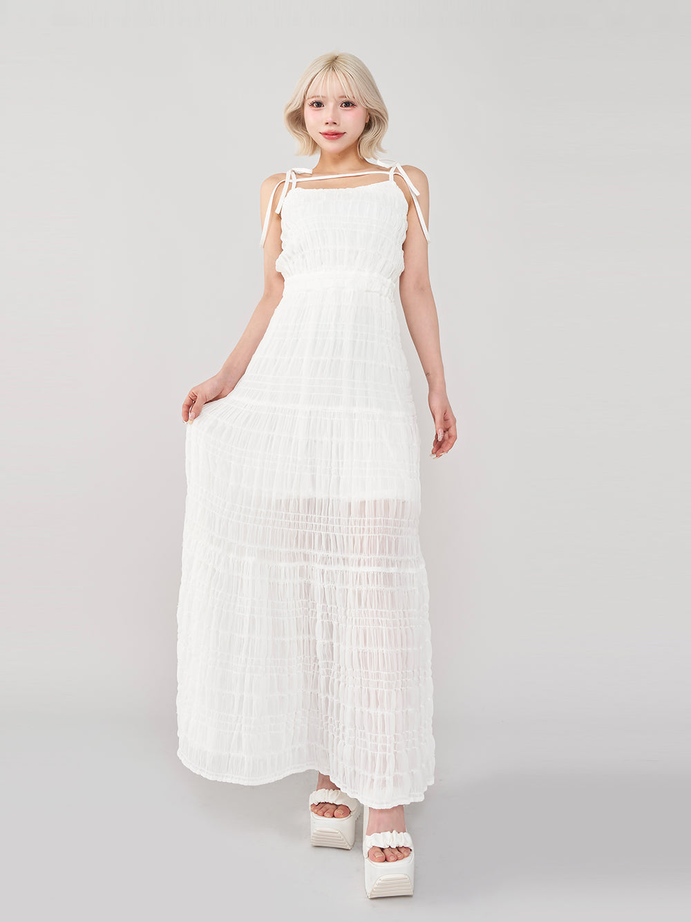 モデル:155cm(着用サイズ:FREE 着用カラー:WHT)