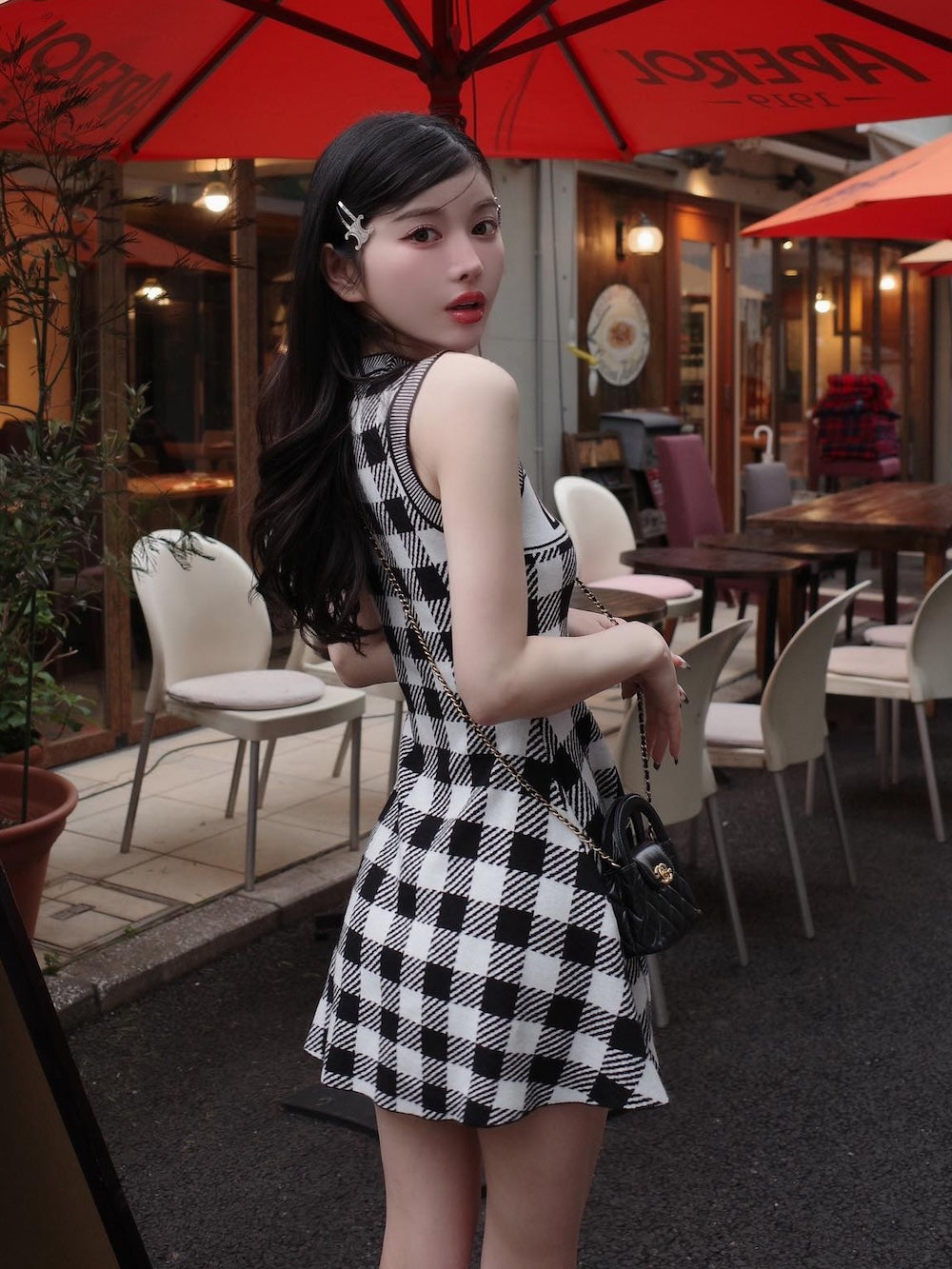 モデル:160cm(着用サイズ:FREE 着用カラー:BLK)
