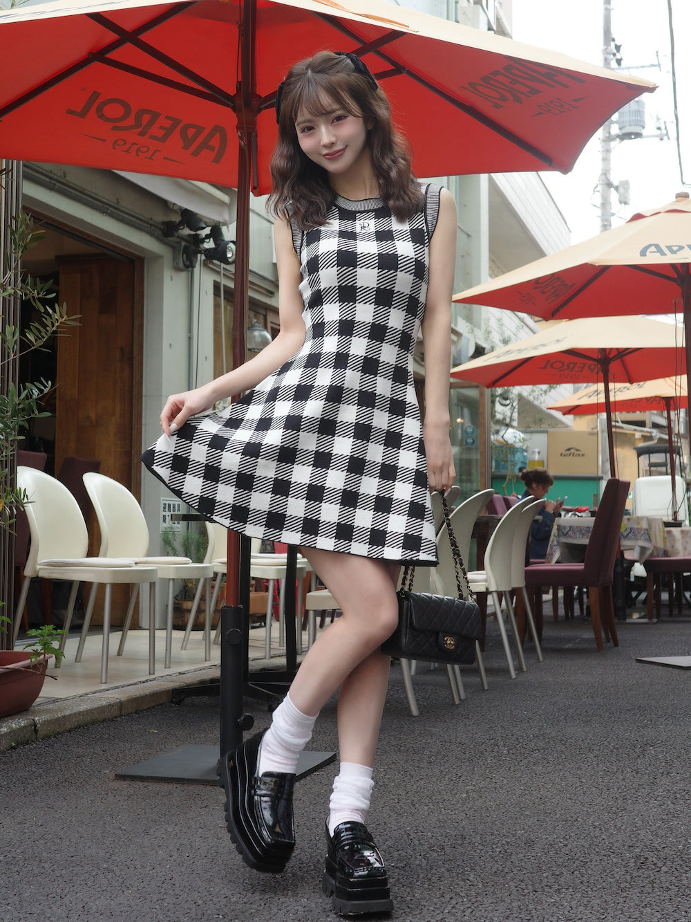 モデル:158cm(着用サイズ:FREE 着用カラー:BLK)