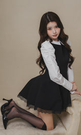 モデル：164cm（着用サイズ：FREE　着用カラー：BLK）
