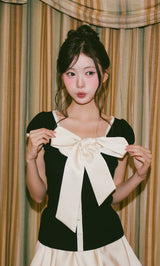 モデル：164cm（着用サイズ：FREE　着用カラー：BLK）