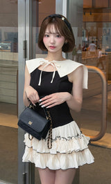 モデル：158cm（着用サイズ：FREE　着用カラー：BLK）