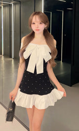 モデル：156cm（着用サイズ：FREE　着用カラー：BLK）