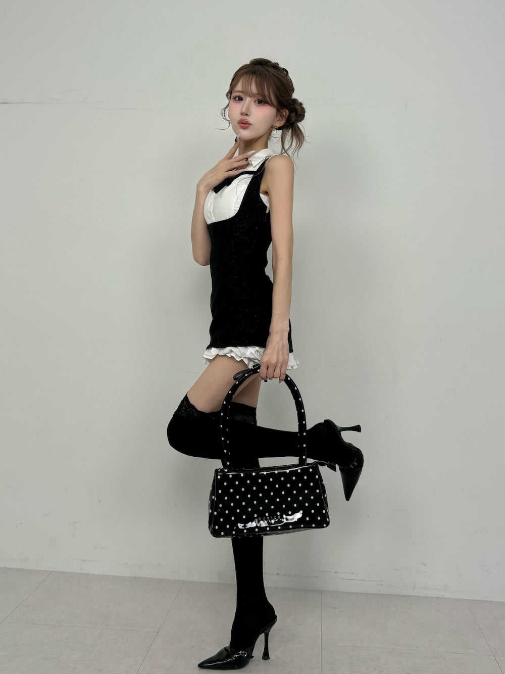 モデル：165cm（着用サイズ：FREE　着用カラー：BLK）