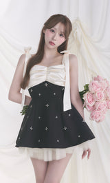 モデル：156cm（着用サイズ：FREE　着用カラー：BLK）