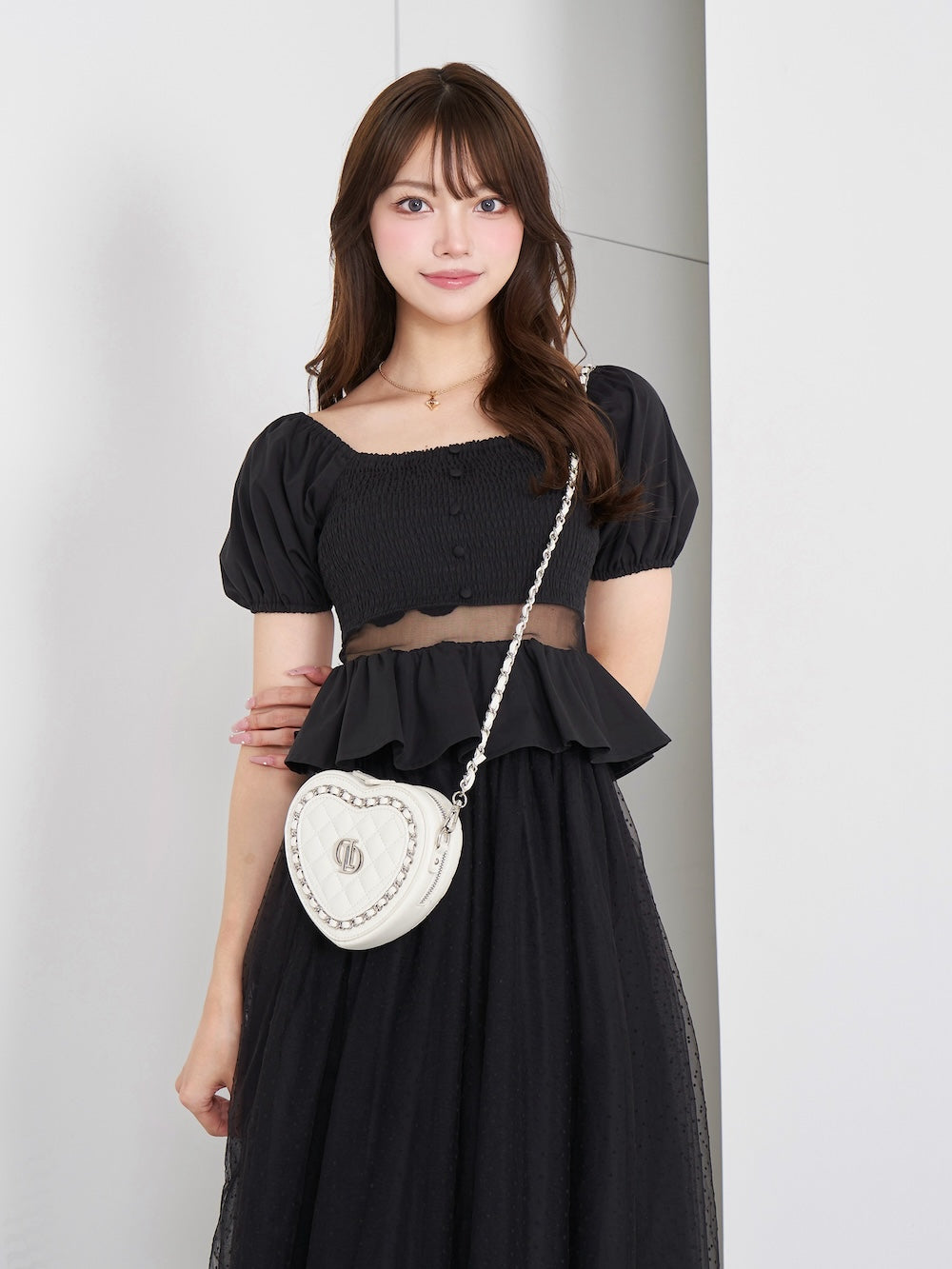 モデル：163cm（着用サイズ：FREE　着用カラー：BLK）