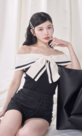 モデル：160cm（着用サイズ：FREE　着用カラー：BLK）
