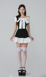 モデル：158cm（着用サイズ：FREE　着用カラー：BLK）