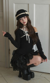 モデル：158cm（着用サイズ：FREE　着用カラー：BLK）